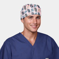 man wearing a navy blue scrub top and a mens scrub hat that is pink with blue boots on it.