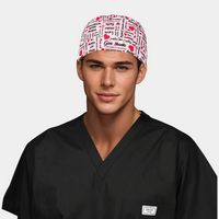 man wearing a black scrub top and a mens breast cancer awareness hat that is pink with words and hearts on it