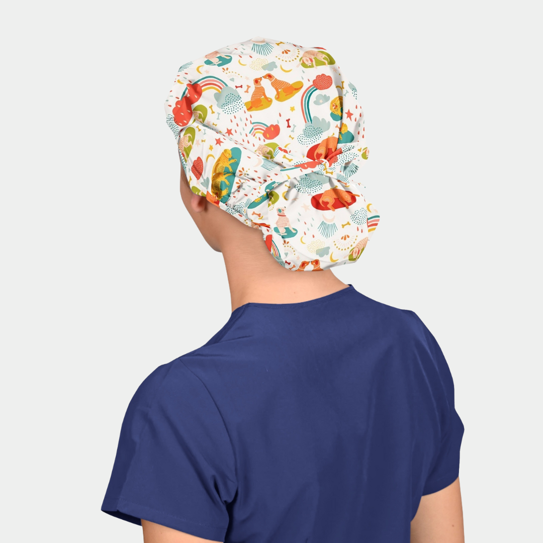 woman wearing a navy scrub top and a white bouffant scrub hat with 