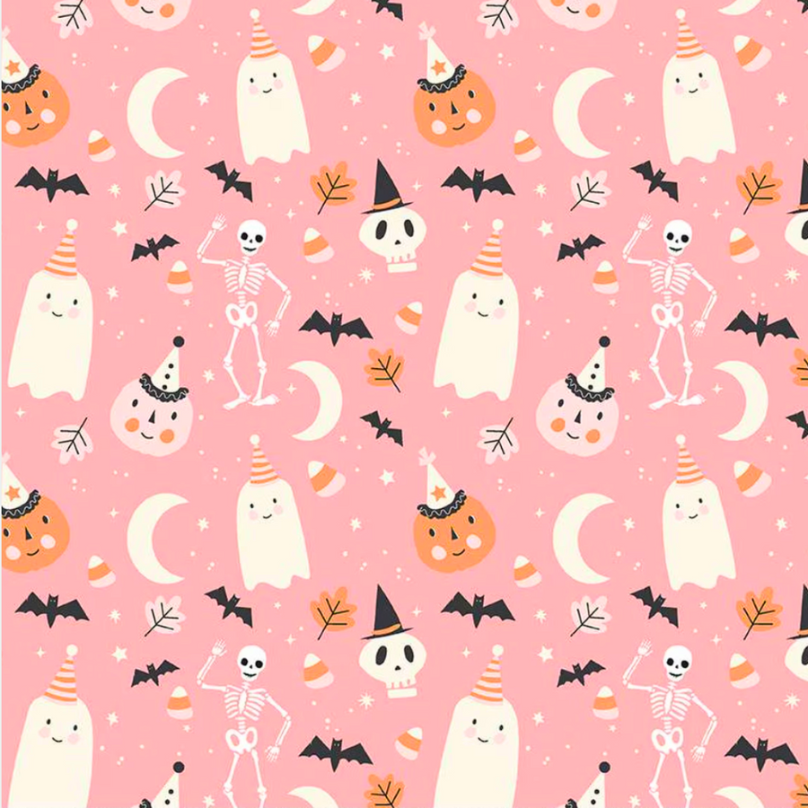 surgical scrub cap Halloween-themed fabric with a pattern with ghosts, skeletons, pumpkins, and bats on a pink background.
