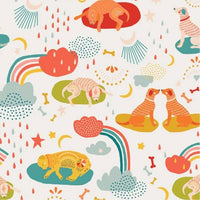 scrub hat fabric with cartoon animals, rainbows, and clouds on a white background