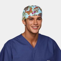man wearing a navy blue scrub top and a light blue mens scrub hat with butterflies, plants and flowers