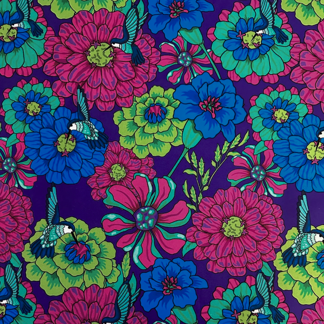 Colorful floral pattern with hummingbirds on a dark purple background