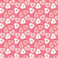 Pattern of heart-shaped candy with text on a pink background