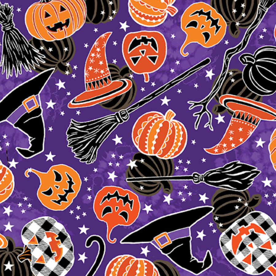 scrub hat fabric that is Halloween-themed fabric pattern with pumpkins, witch hats, brooms, and cats on a purple background.