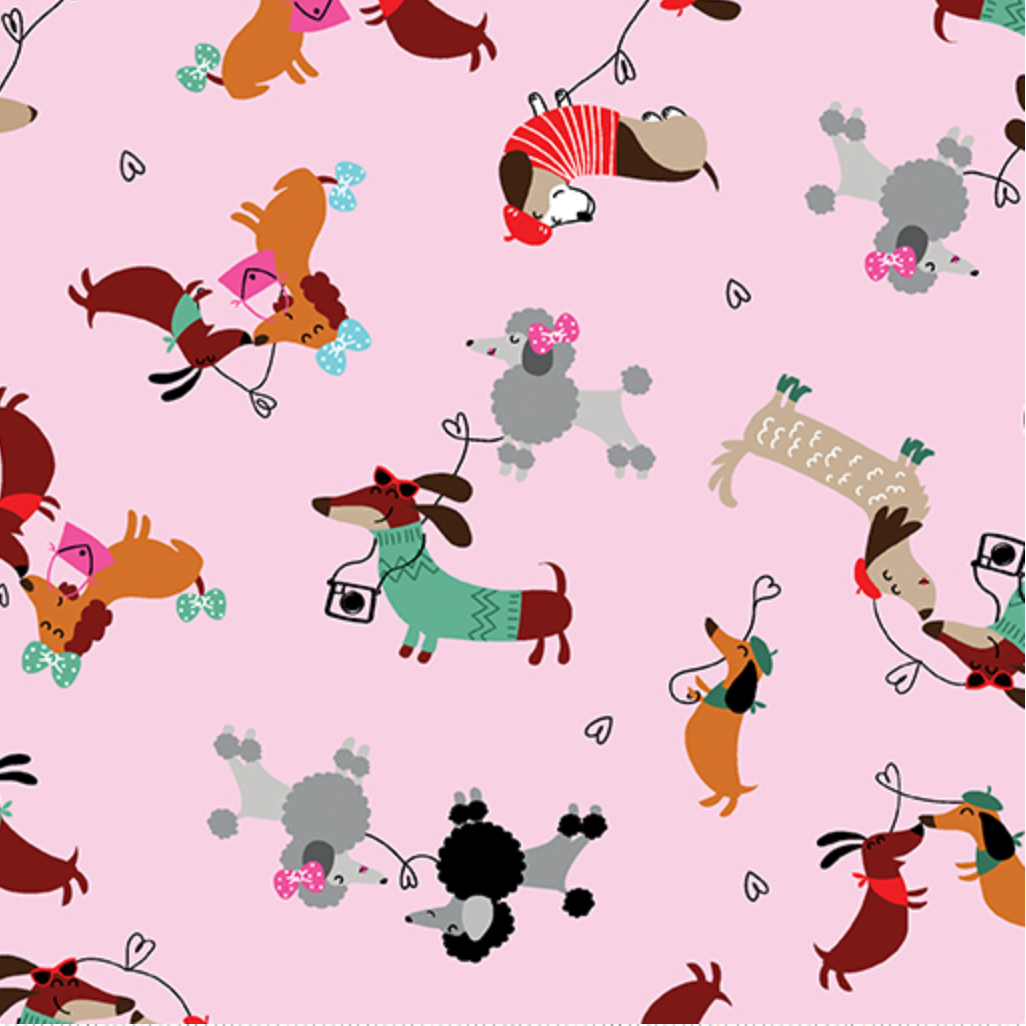 surgical hat fabric with a Pattern of dogs on a pink background