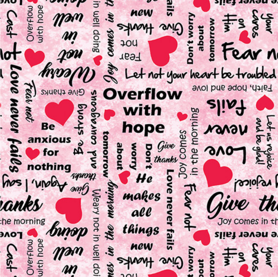 a breast cancelr scrub hat fabric that is pink with encouraging words and red hearts 