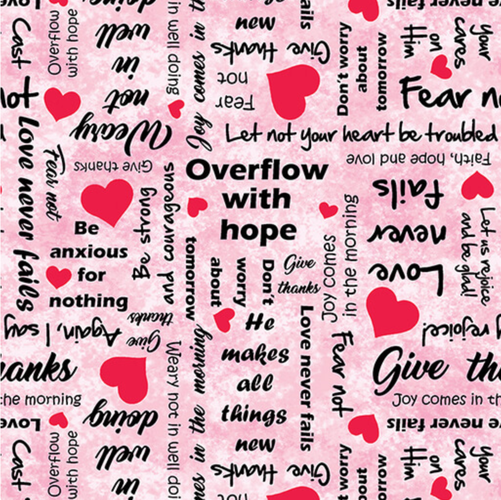 a breast cancelr surgrical hat fabric that is pink with encouraging words and red hearts 