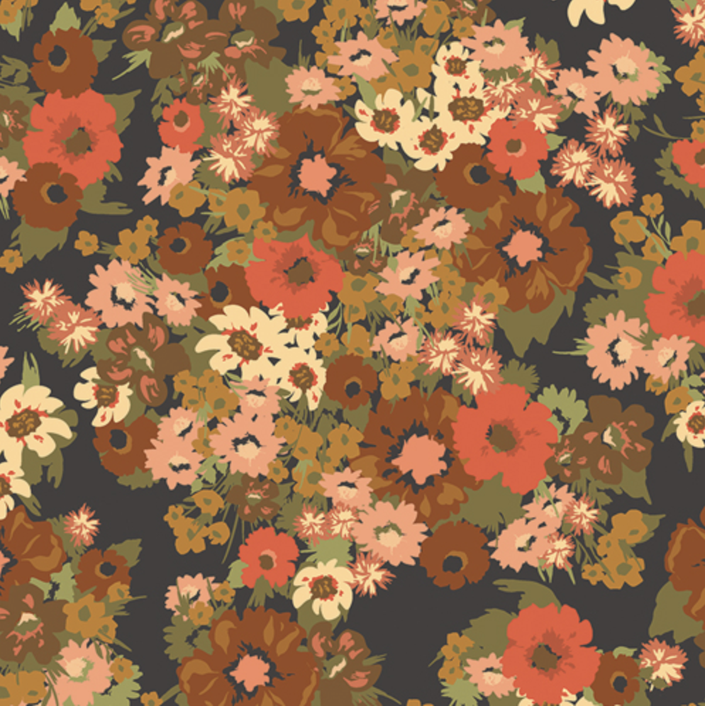 A dense floral pattern featuring retro-style flowers in coral red, peach, orange, cream, and brown with olive green leaves on a dark charcoal gray background.