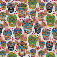 A repeating Day of the Dead sugar skull pattern on a light textured background, featuring colorful floral and geometric skull designs in green, blue, pink, orange, yellow, and red.