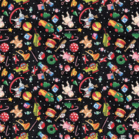 scrub hat fabri that is black with christmas toys on it